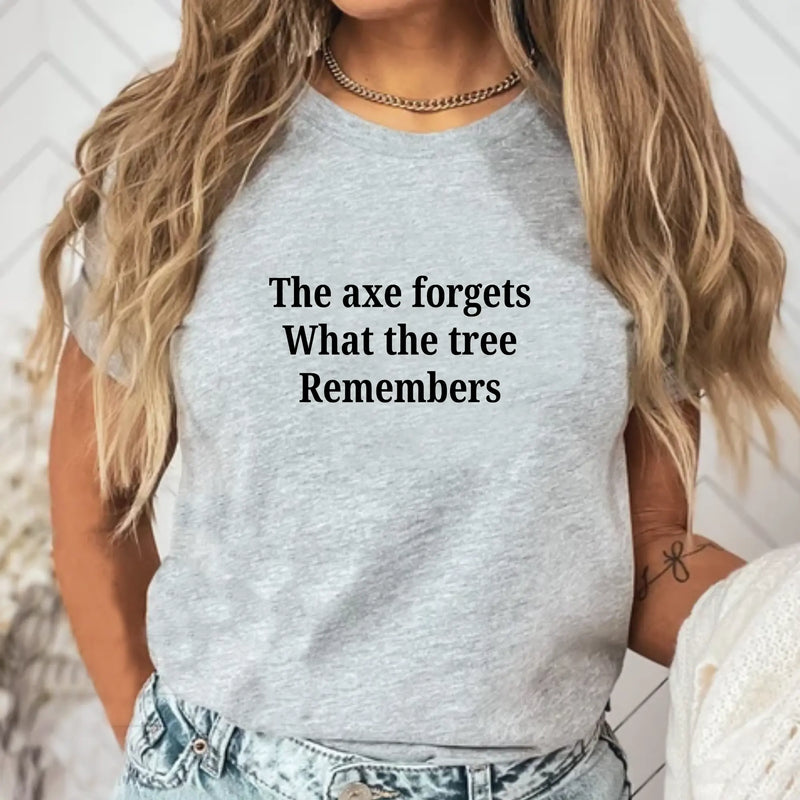 The Axe Forgets, But the Tree Remembers – Women’s Empowerment T-Shirt
